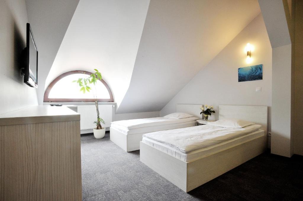 Hostel Promenada Rzeszów Rom bilde